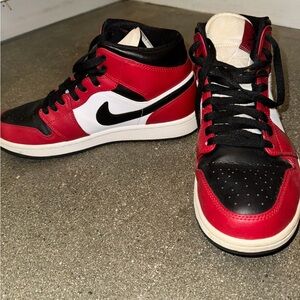 Nike Red and Black Sneakers with Iconic Design